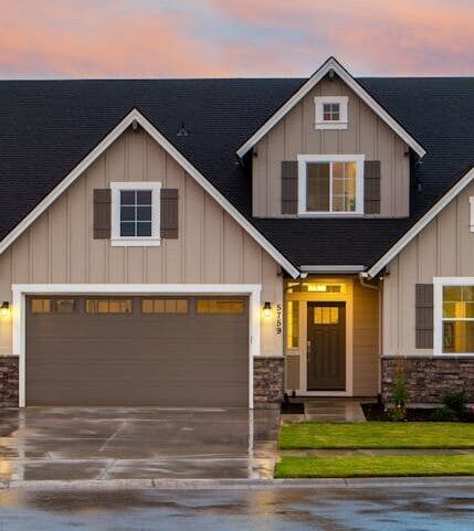 Charming family home in Boise, ID with a modern facade and spacious garage.